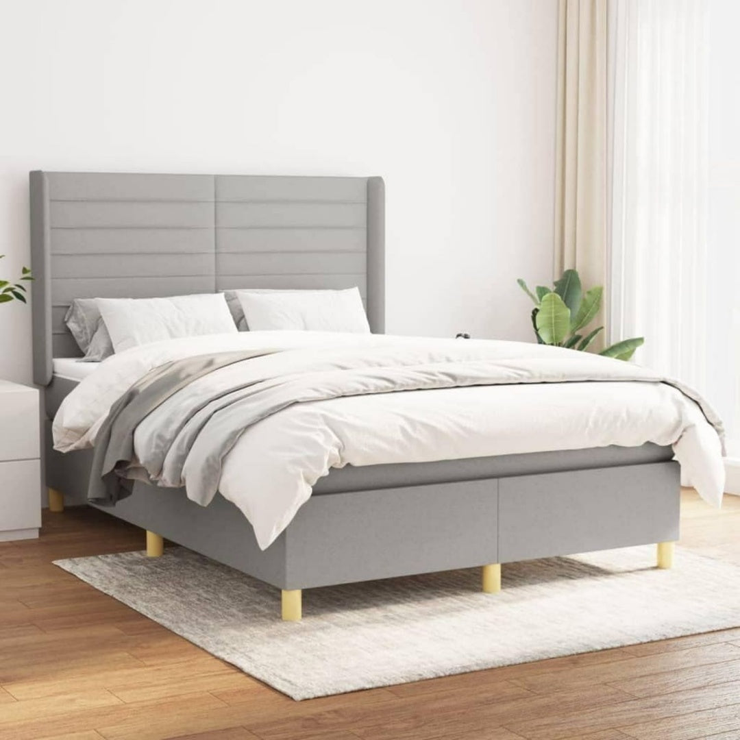 Sommier a lattes gris clair en tissu et contreplaque robuste
